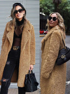 Long teddy coat in tan camel fuzzy fabric, open front with plush collar.