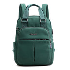 Green water-resistant backpack with padded top handles and front zip pocket, two front sections