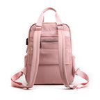 Pink backpack with front zip pocket, two side compartments, and adjustable shoulder straps
