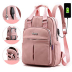Light pink water-resistant backpack with USB charging port, padded handles, front zip pocket