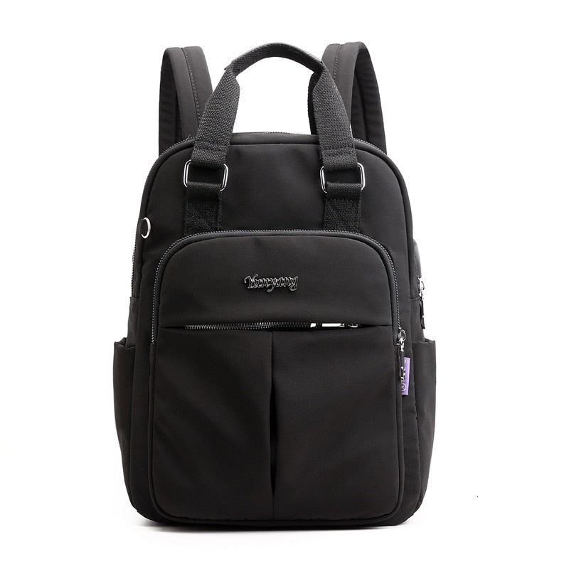 Black backpack with adjustable shoulder straps and front zip pocket panel