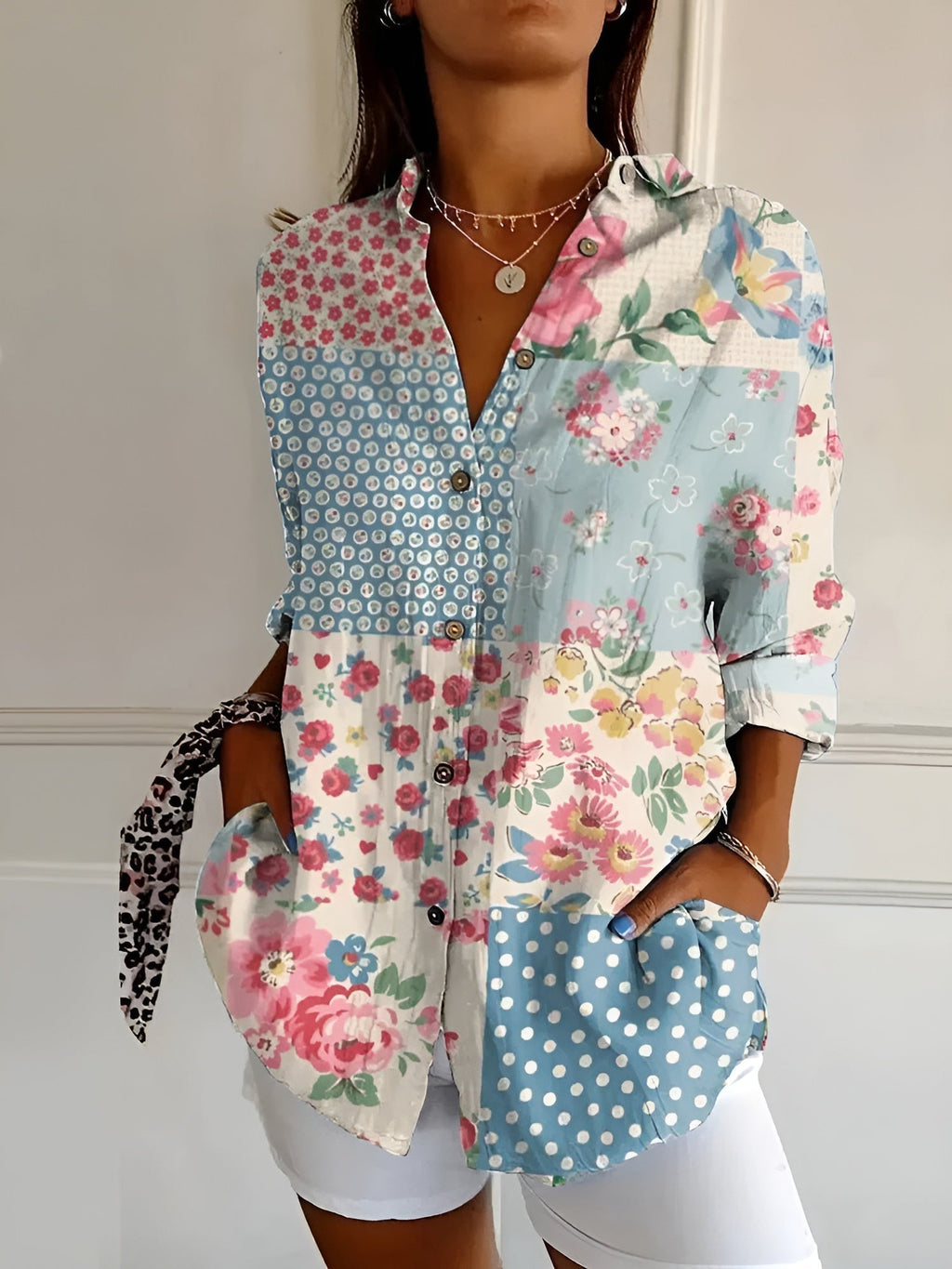 Abstract print split-neck button blouse with long sleeves, blue and pink