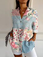 Abstract print split-neck button blouse with long sleeves, blue and pink