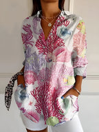 Abstract print split-neck button blouse with long sleeves, white with pink and purple coral