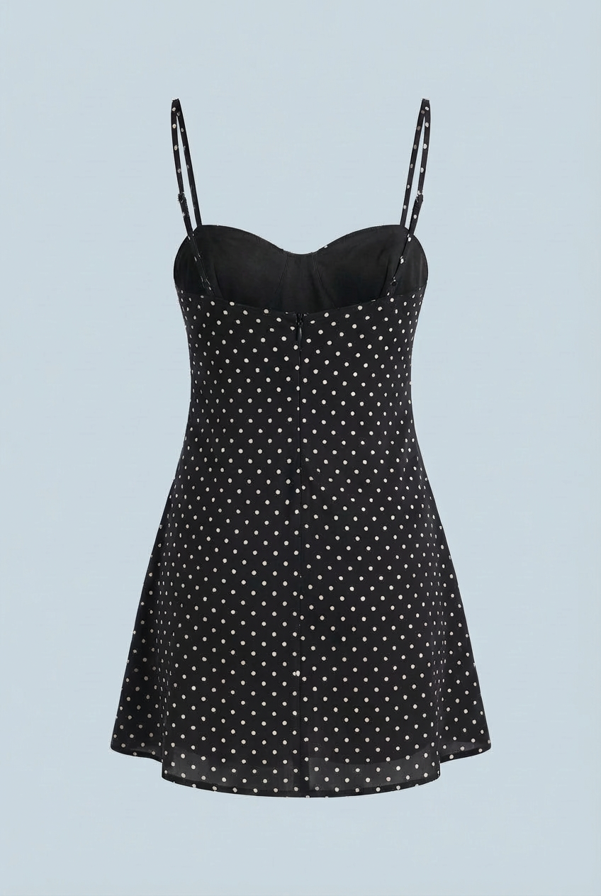 Black polka dot mini dress with sweetheart neckline and thin spaghetti straps