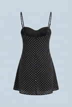 Black polka dot mini dress with sweetheart neckline and thin spaghetti straps