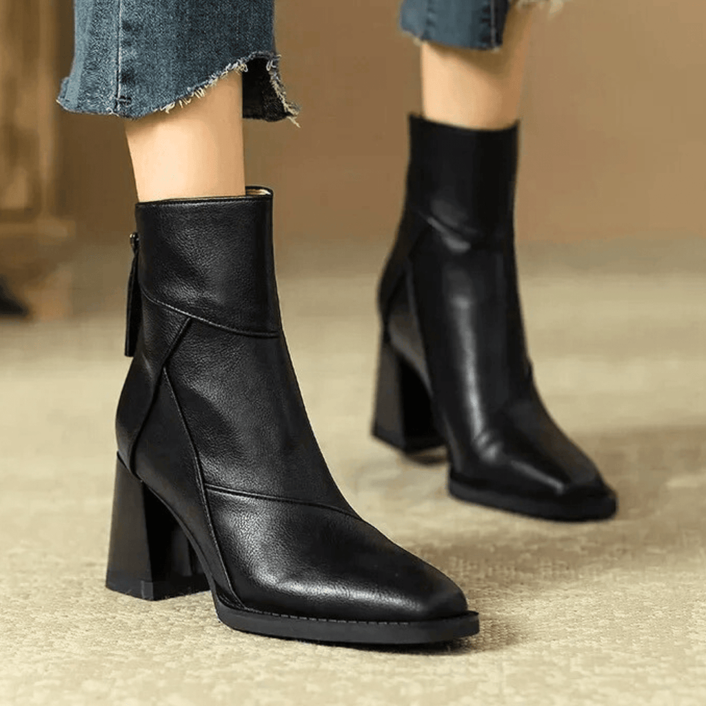 Black ankle-fit block heel boots with side zipper and smooth leather-like finish