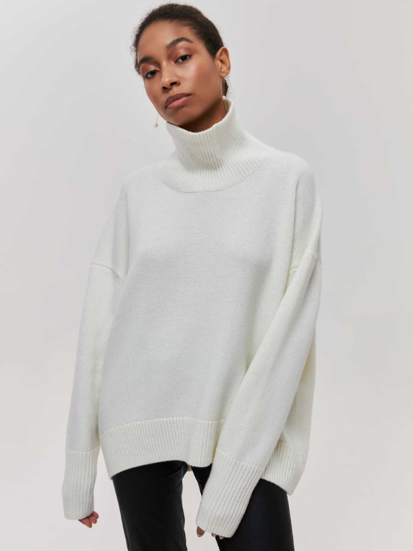 Ivory knitted turtleneck sweater with long sleeves and ribbed neckline and hem