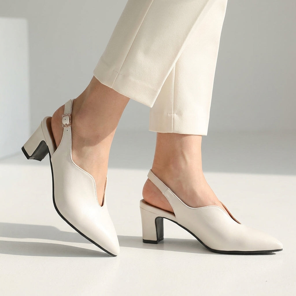 White pointed toe slingback sandals with block heel and sling strap