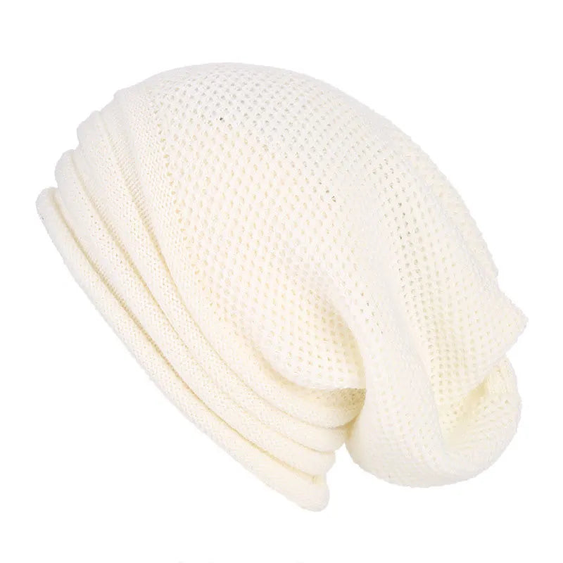 White knitted beanie with textured knit and fold-over cuff