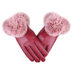 Burgundy leather gloves with soft pink faux fur cuffs and stitched fingertips.