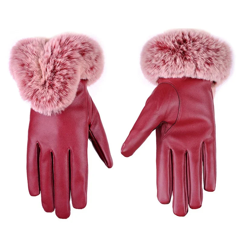 Burgundy leather gloves with fluffy pink faux fur cuffs and five-finger stitching.