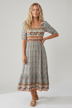 Boho print midi dress with short sleeves, smocked waist, and decorative border hem