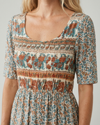 Boho print midi dress bodice with scoop neckline, smocked waist, teal floral pattern