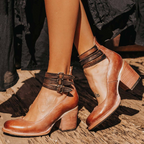 Brown leather ankle-strap shoes with side zip, buckle strap detail, and block heel.