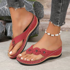Women's wedge sandals in red with flower applique and white beaded ankle strap