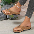 Women's wedge sandals in tan/brown with flower appliques and beaded ankle strap