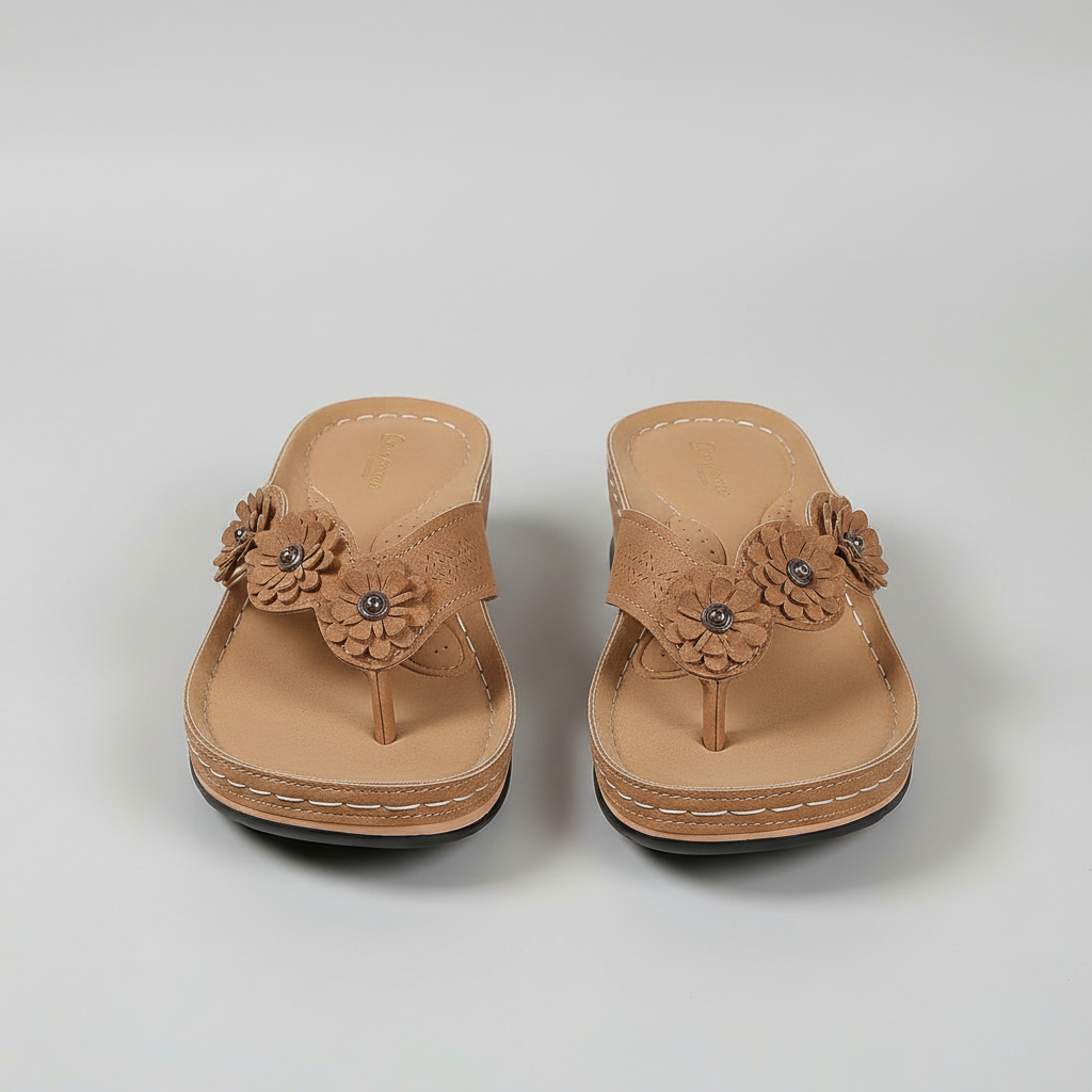 Women's wedge sandals in tan with flower applique on thong-style straps