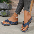 Women's wedge sandals in blue with flower appliques and beaded ankle strap