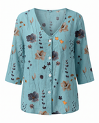 Women's three-quarter sleeve blouse, teal with multicolor floral print and button front