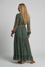 Embroidered bohemian maxi dress, back view, long sleeves and tiered skirt in green