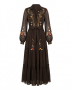 Embroidered maxi dress front view with V-neck, long sleeves, and waist tie belt in dark brown