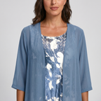 Blue layered dress detail: open-front overlay with floral print square neckline