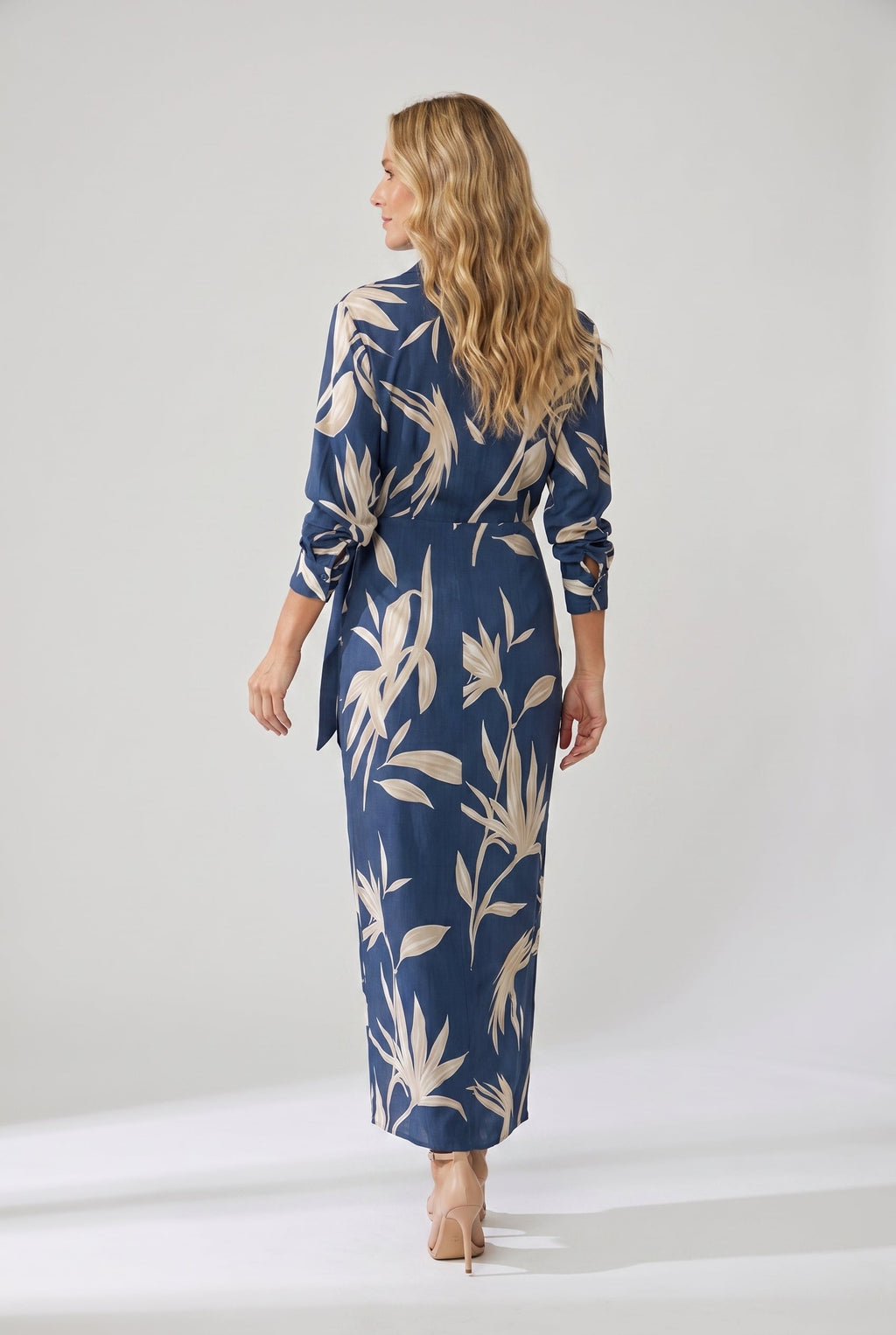 Blue leaf-print maxi wrap dress with long sleeves and waist tie, side slit