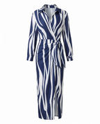 Navy and white abstract stripe maxi wrap dress with V-neck, long sleeves, waist tie