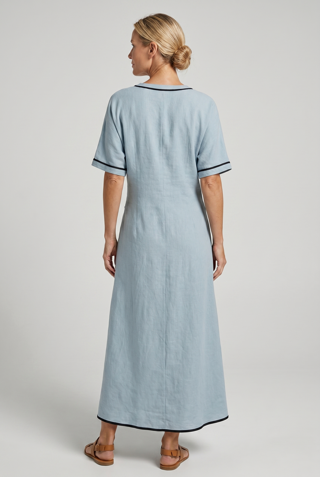 Blue maxi summer dress, back view with V-neck twist-front knot and black trim