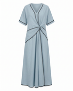 Blue maxi summer dress, front view with V-neck twist-front knot and black trim