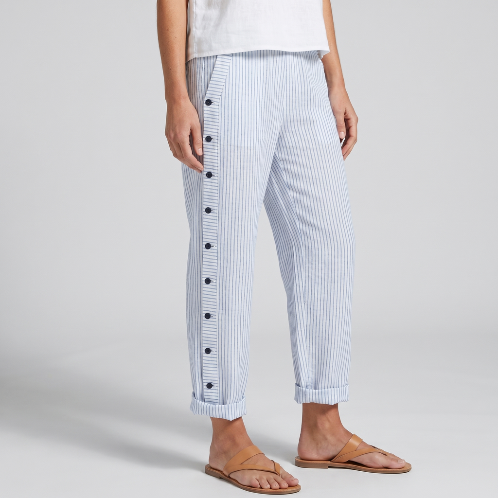 Women’s striped trousers in blue with button placket detail along the front