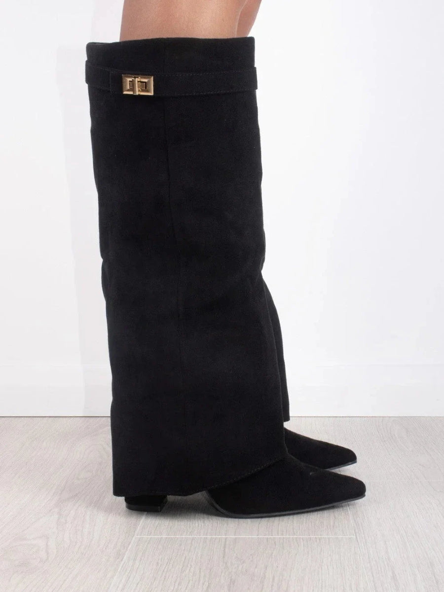 Black knee-high suede boots with wide top band and gold buckle detail, block heel