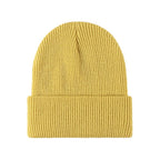 Yellow knitted beanie with ribbed fold-over brim