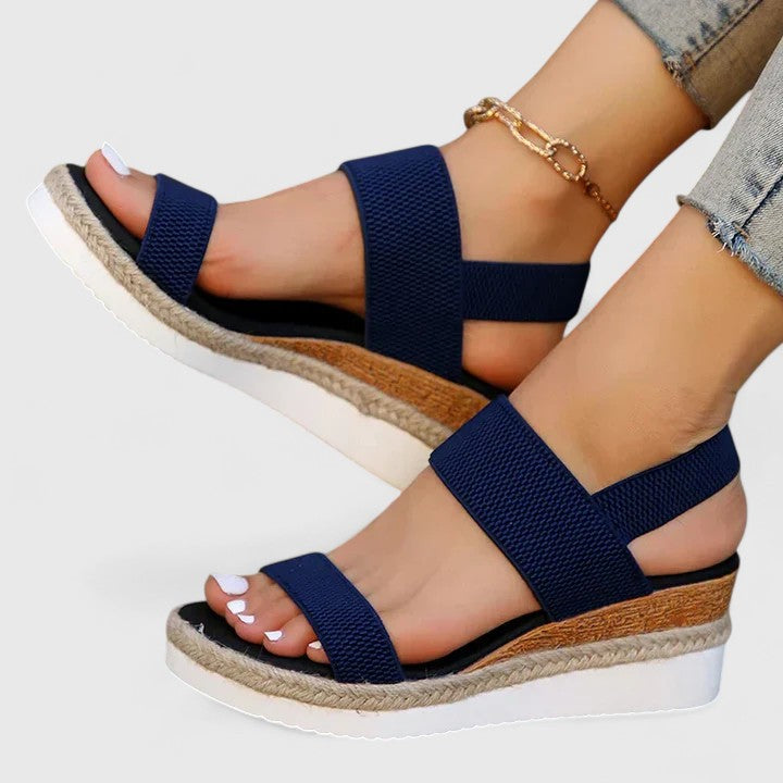 Navy two-strap platform sandals with open toe and jute-edged sole
